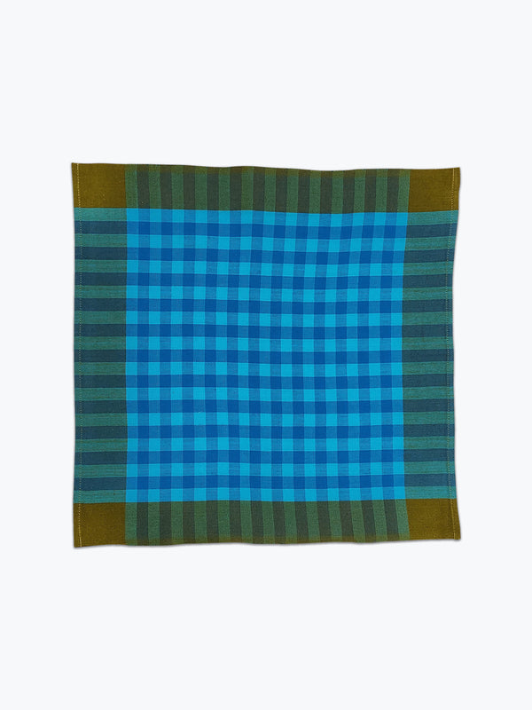 Bright sky blue and olive green plaid cloth napkin.