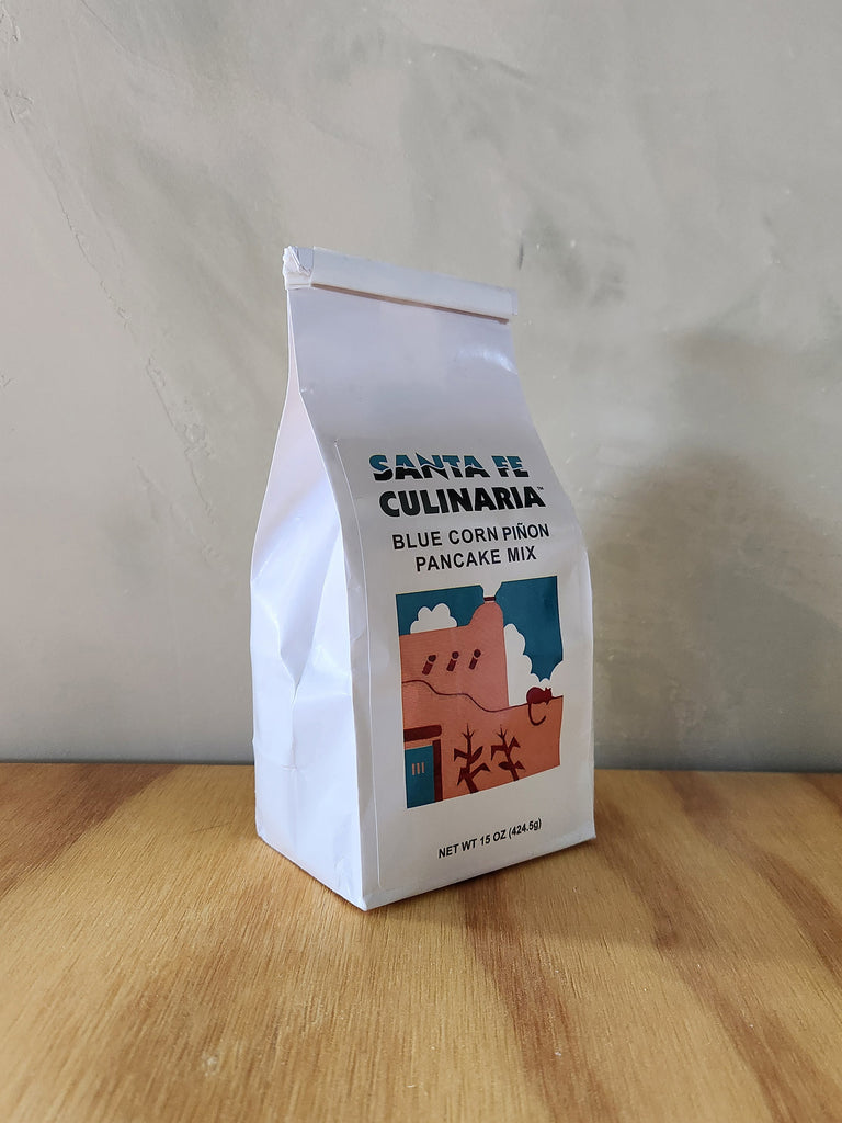 A 15oz bag of sana fe culinaria's blue corn pinon pancake mix.