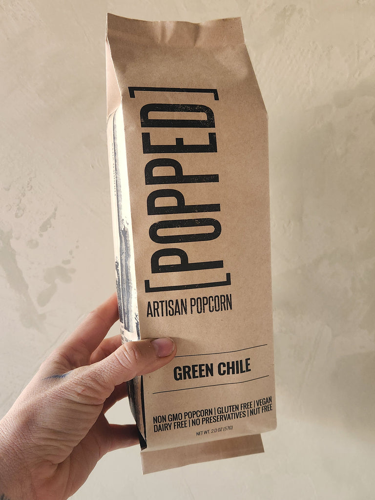 a bag of popcorn seasoned with hatch green chile powder.