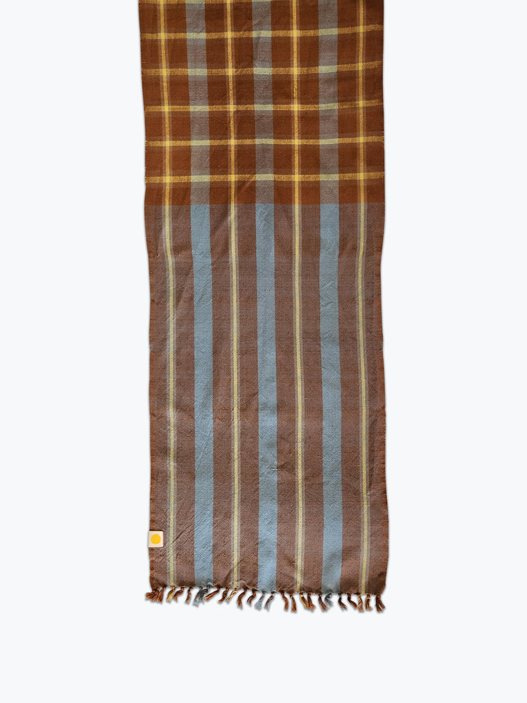 brown and pale blue plaid table runner