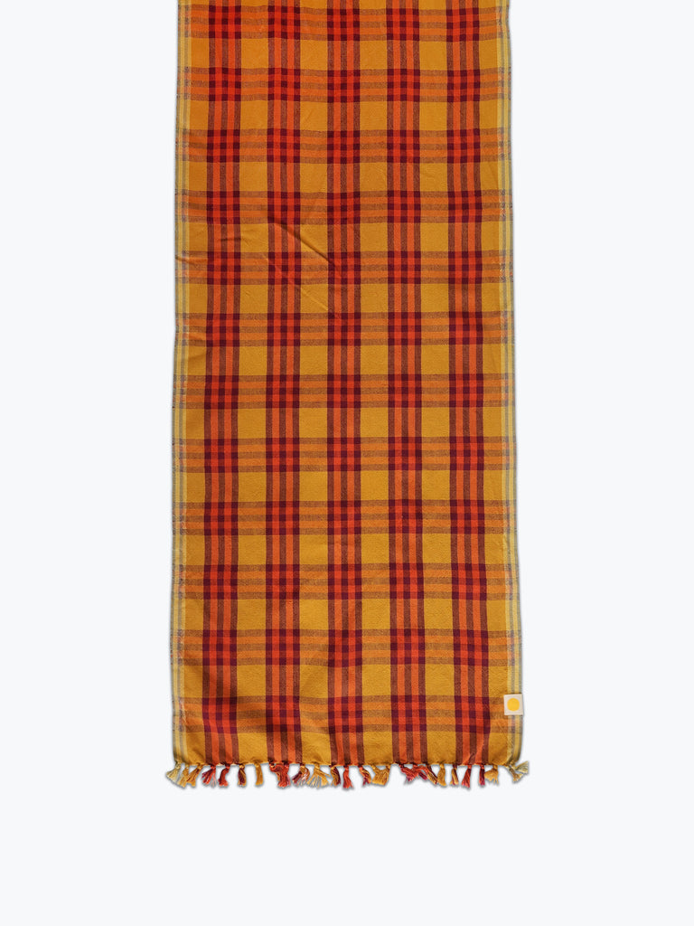 Orange and red plaid table runner