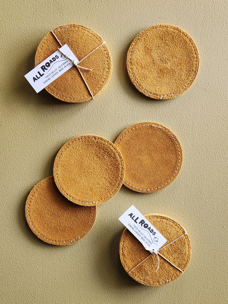 Set of 4 suede drink coasters. 